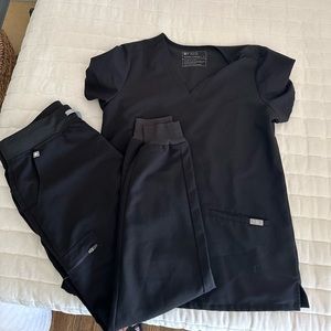 Black set scrubs by FIGS.